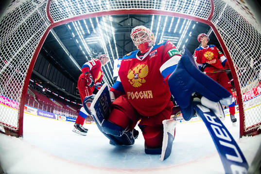 Goalkeeper Yaroslav Askarov of Russia looks dejected