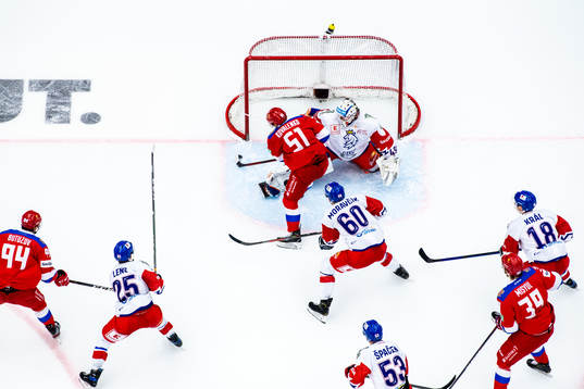 Nikolai Kovalenko of Russia scores 3-3 behind goalkeeper