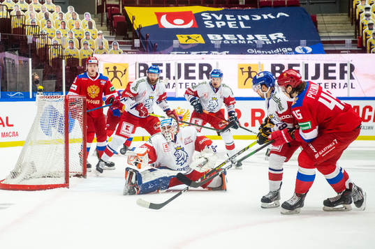Goalkeeper Yaroslav Askarov of Russia and Matej Blumel of