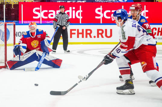 Goalkeeper Yaroslav Askarov of Russia and Matej Blumel of