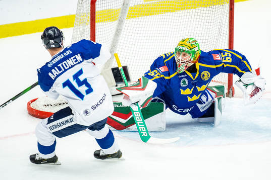 Goalkeeper Christoffer Rifalk of Sweden and Miro Aaltonen