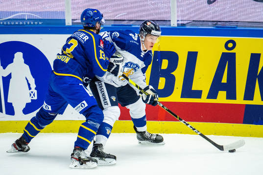 Anton Lundell of Finland and Niklas Hansson of Sweden