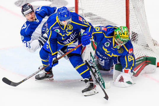 Max Friberg and goalkeeper Christoffer Rifalk of Sweden
