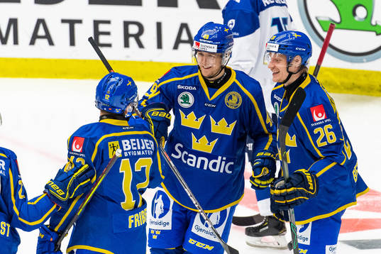 Filip Hållander of Sweden celebrates with Max Friberg and
