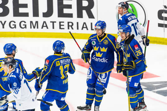 Filip Hållander of Sweden celebrates with Max Friberg and
