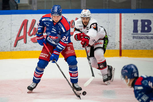 Oskarshamns Kim Strömberg och Malmö Redhawks Joseph Veleno