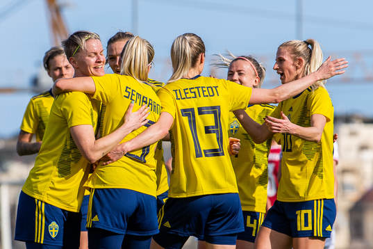 Players of Sweden celebrate