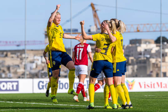 Nilla Fischer and Linda Sembrant of Sweden celebrate