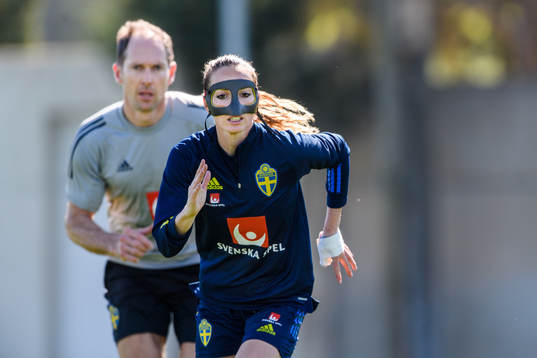 Kosovare Asllani in a protective mask due to a nose injury