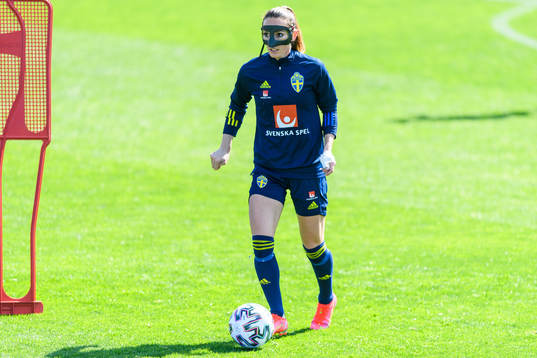 Kosovare Asllani in a protective mask worn due to a nose