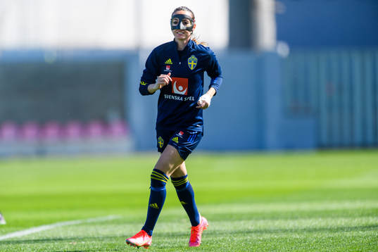 Kosovare Asllani in a protective mask worn due to a nose