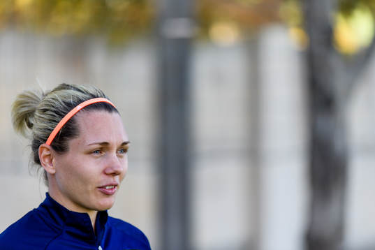 Goalkeeper Jennifer Falk is interviewed by the media