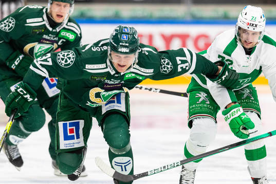 Färjestads Adam Ginning och Rögles Daniel Zaar