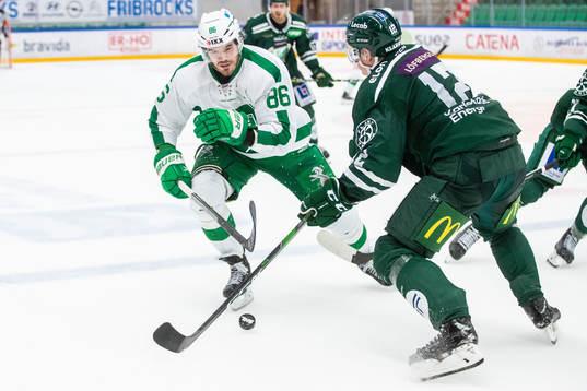 Rögles Eric Gelinas och Färjestads Niclas Lundgren