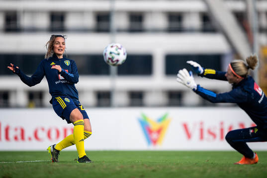Johanna Rytting Kaneryd and goalkeeper Jennifer Falk of
