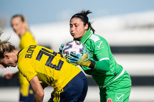 Rebecka Blomqvist of Sweden and goalkeeper Janice Xuereb of
