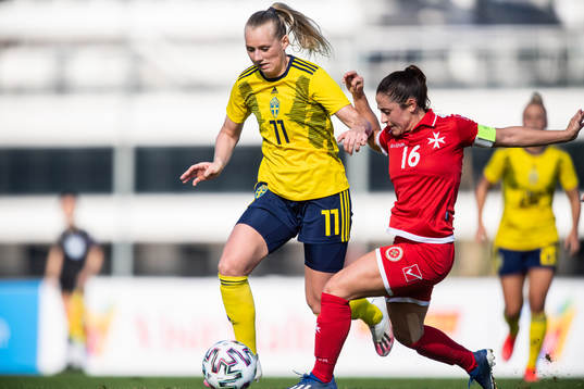 Stina Blackstenius of Sweden and Charlene Zammit of Malta