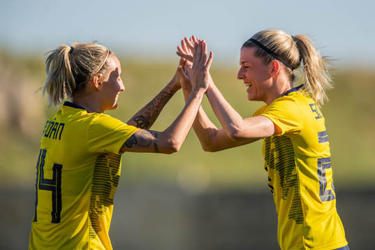 Nathalie Björn and Olivia Schough of Sweden celebrate