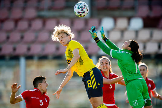 Lina Hurtig of Sweden and goalkeeper Janice Xuereb of Malta