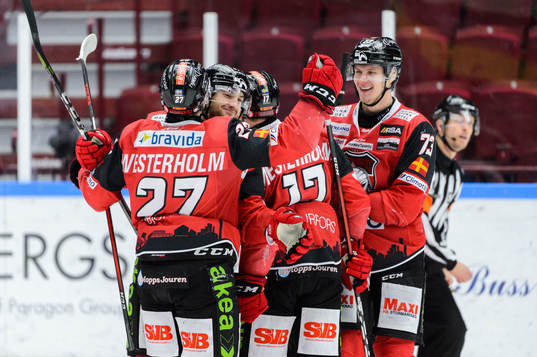 Malmö Redhawks Pathrik Westerholm jublar med lagkamrater