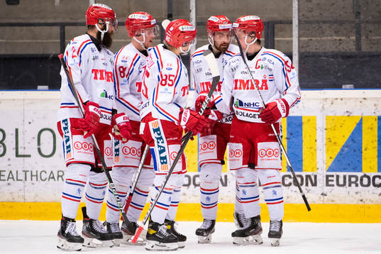 Timrås spelare jublar
