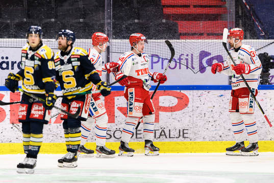 Timrås Jonathan Dahlén jublar med Albin Lundin