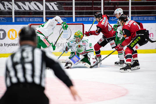 Malmö Redhawks Adam Johnson och Oliver Lauridsen mot