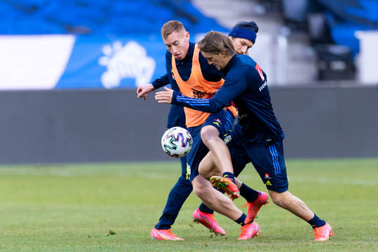 Dejan Kulusevski and Kristoffer Olsson of the Swedish