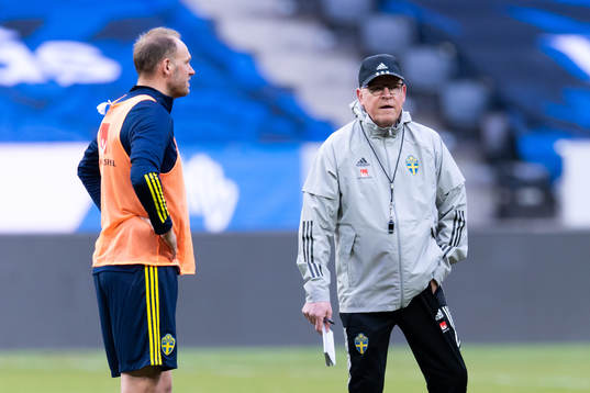 Andreas Granqvist and head coach Janne Andersson of the