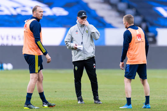 Andreas Granqvist and head coach Janne Andersson of the