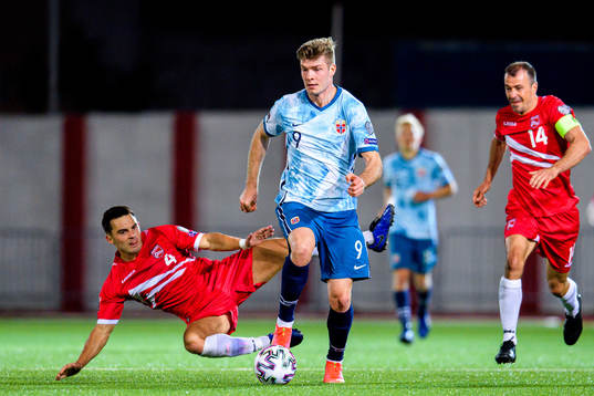 Alexander Sørloth of Norway against John Sergeant and Roy