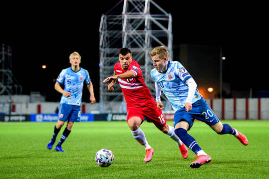 Liam Walker of Gibraltar and Jens Petter Hauge of Norway