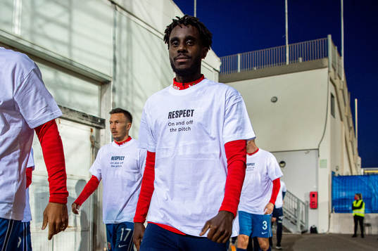 Tokmac Nguen of Norway wearing a t-shirt with the message