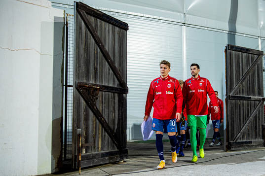 Martin Ødegaard and goalkeeper Rune Almenning Jarstein of
