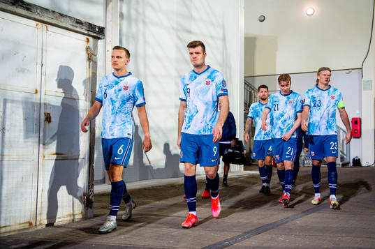 Marius Lode and Alexander Sørloth of Norway at half-time