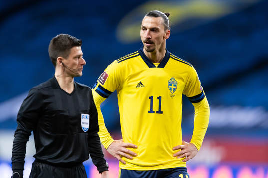 Referee Bastien Benoit and Zlatan Ibrahimovic of Sweden