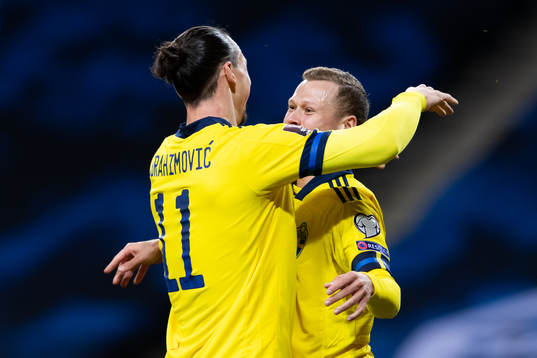Zlatan Ibrahimovic and Viktor Claesson of Sweden celebrates