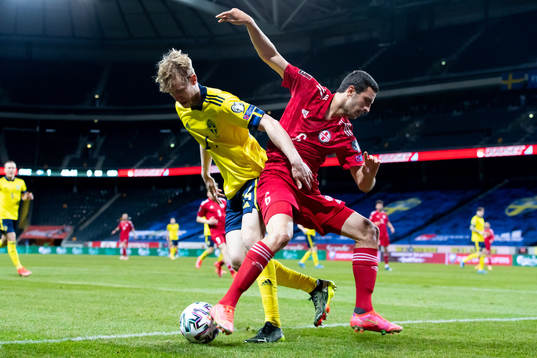 Filip Helander of Sweden and Giorgi Aburjania of Georgia