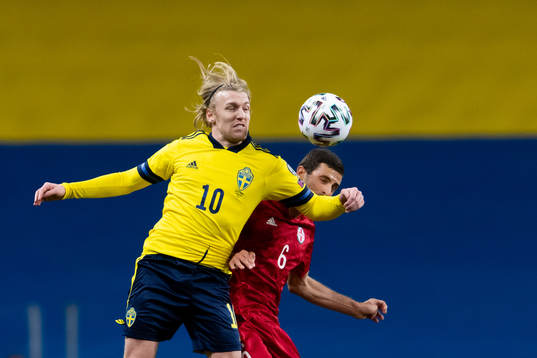 Emil Forsberg of Sweden and Giorgi Aburjania of Georgia