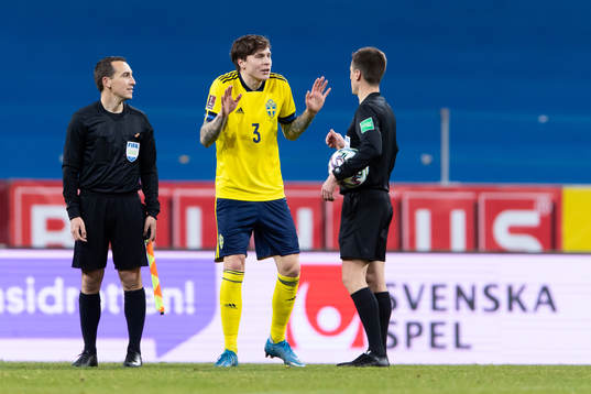 Victor Nilsson Lindelöf of Sweden talks to the referee