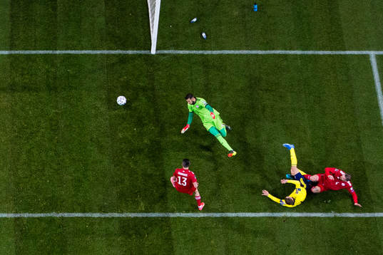 Viktor Claesson of Sweden scores 1-0 passed goalkeeper