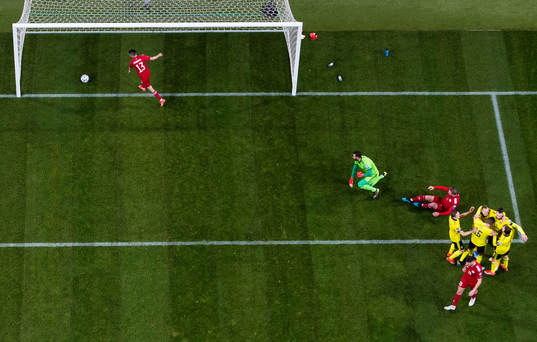 Viktor Claesson of Sweden scores 1-0 and celebrates