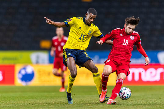 Alexander Isak of Sweden and Khvicha Kvaratskhelia of