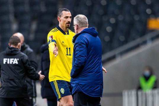 Zlatan Ibrahimovic of Sweden greets Janne Andersson, head