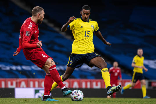 Guram Kashia of Georgia and Alexander Isak of Sweden