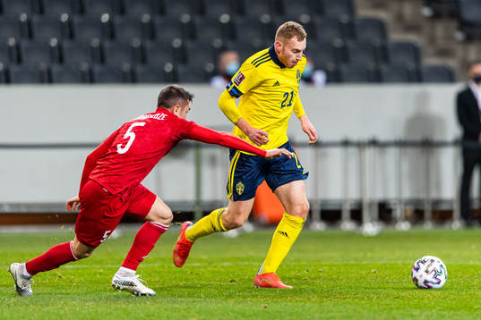Guram Giorbelidze of Georgia and Dejan Kulusevski of Sweden