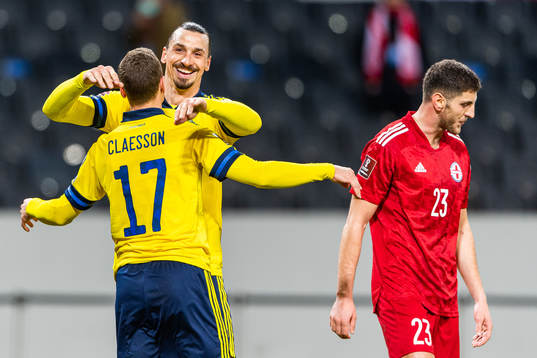 Viktor Claesson and Zlatan Ibrahimovic of Sweden celebrate