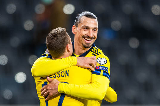 Viktor Claesson and Zlatan Ibrahimovic of Sweden celebrate