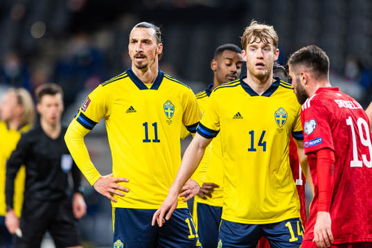 Zlatan Ibrahimovic and Filip Helander of Sweden