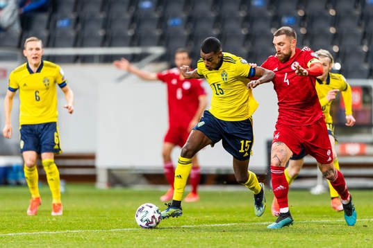Alexander Isak of Sweden and Guram Kashia of Georgia